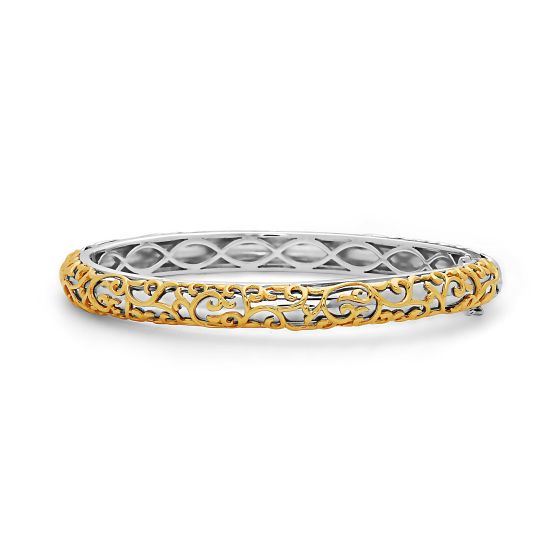 Sterling silver and 18 karat yellow gold Ivy Lace bangle bracelet.